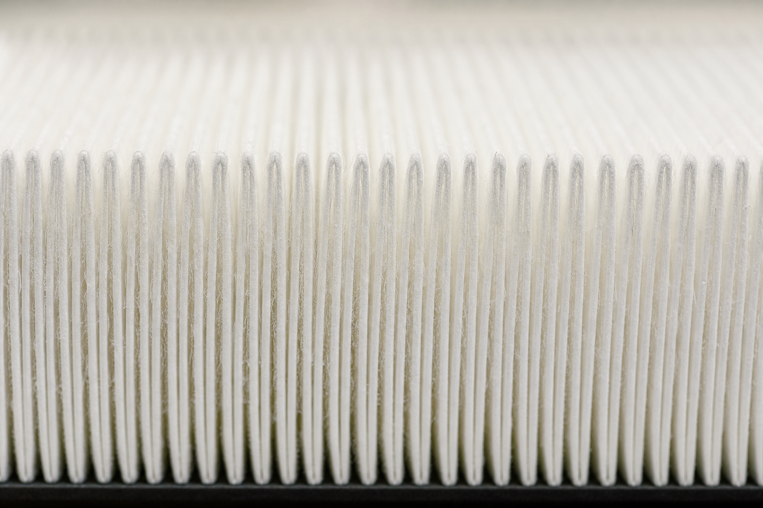 MERV 13 HVAC filter media macro, dense high-efficiency pleats