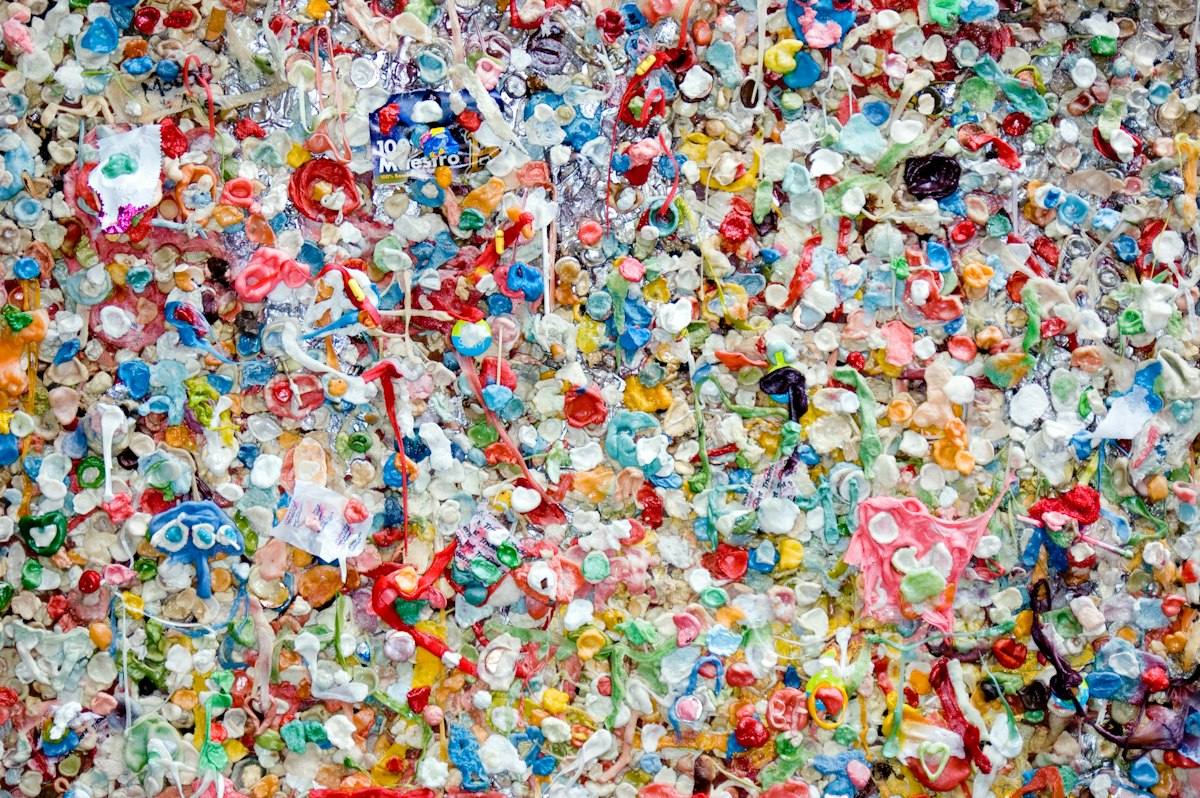 Plastic particles and microplastic granules scattered on a surface