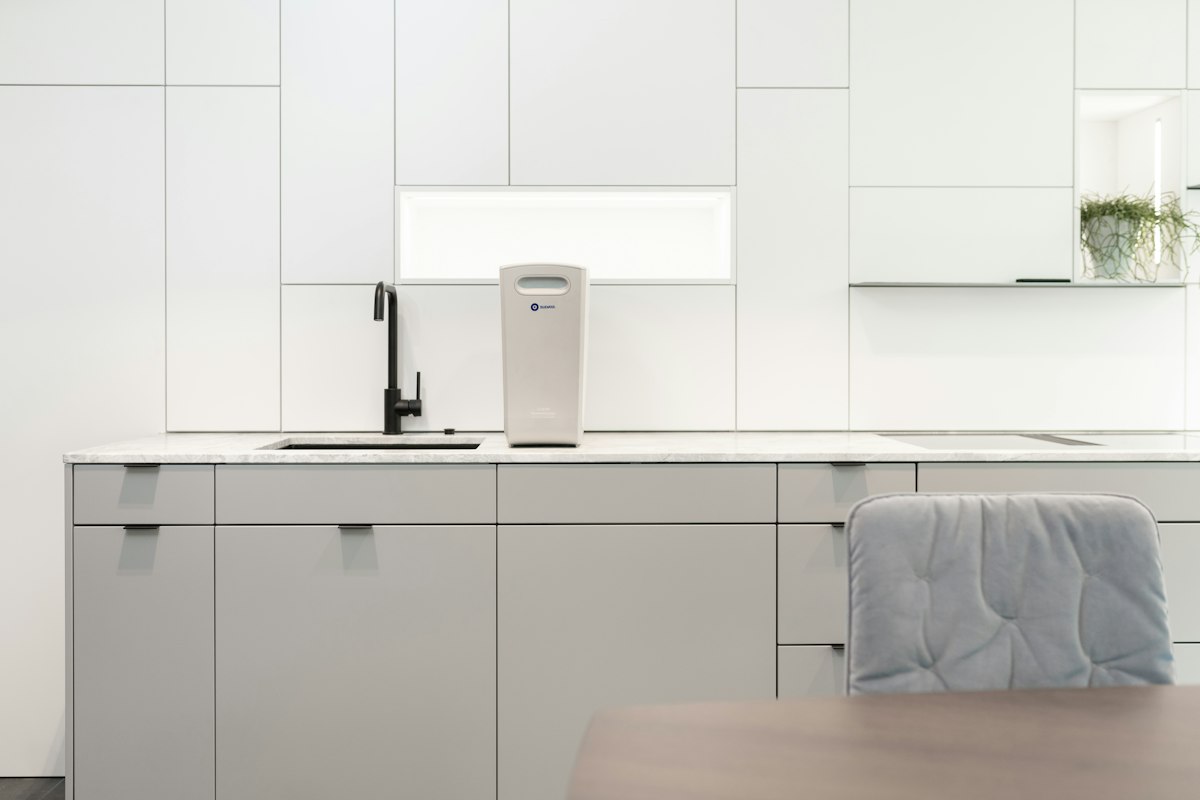 a white kitchen with white cabinets