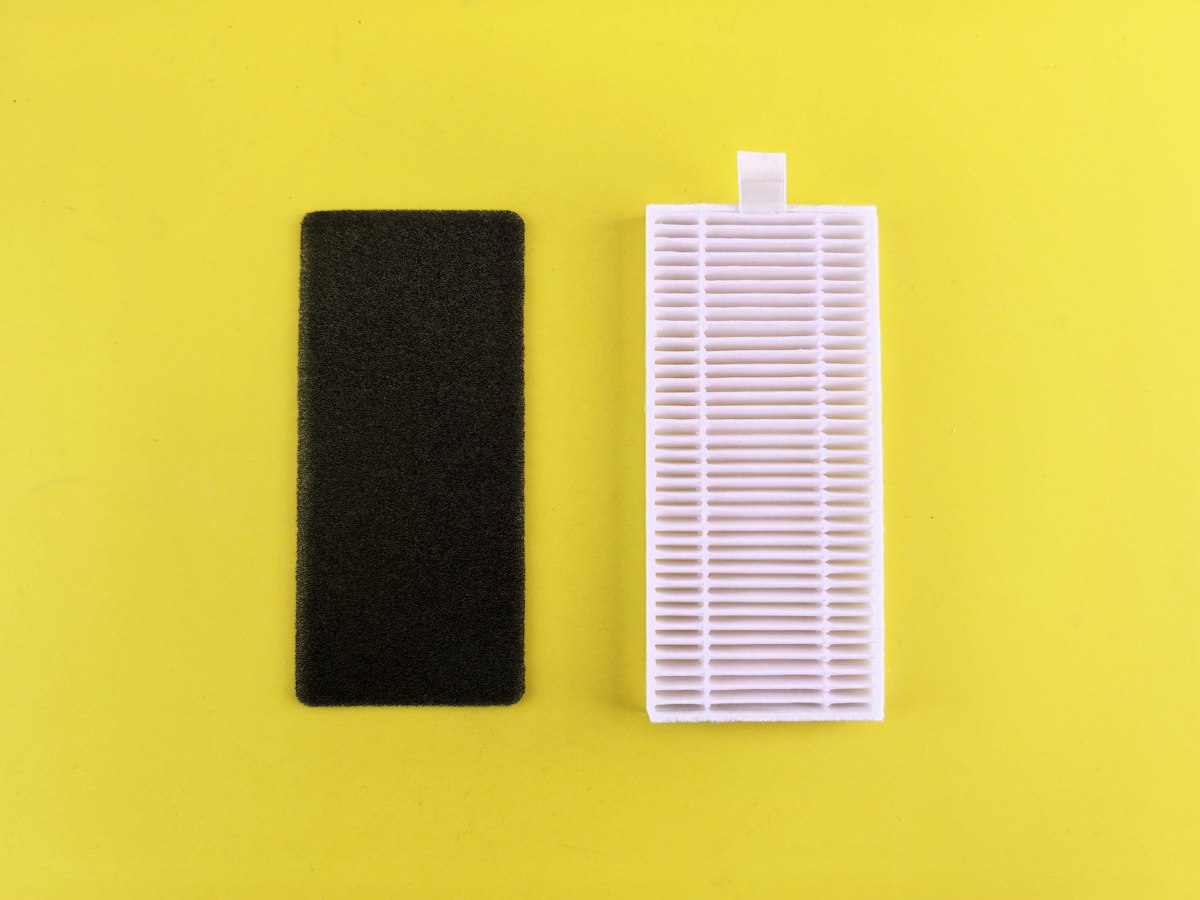 Black filter next to a white filter on yellow background